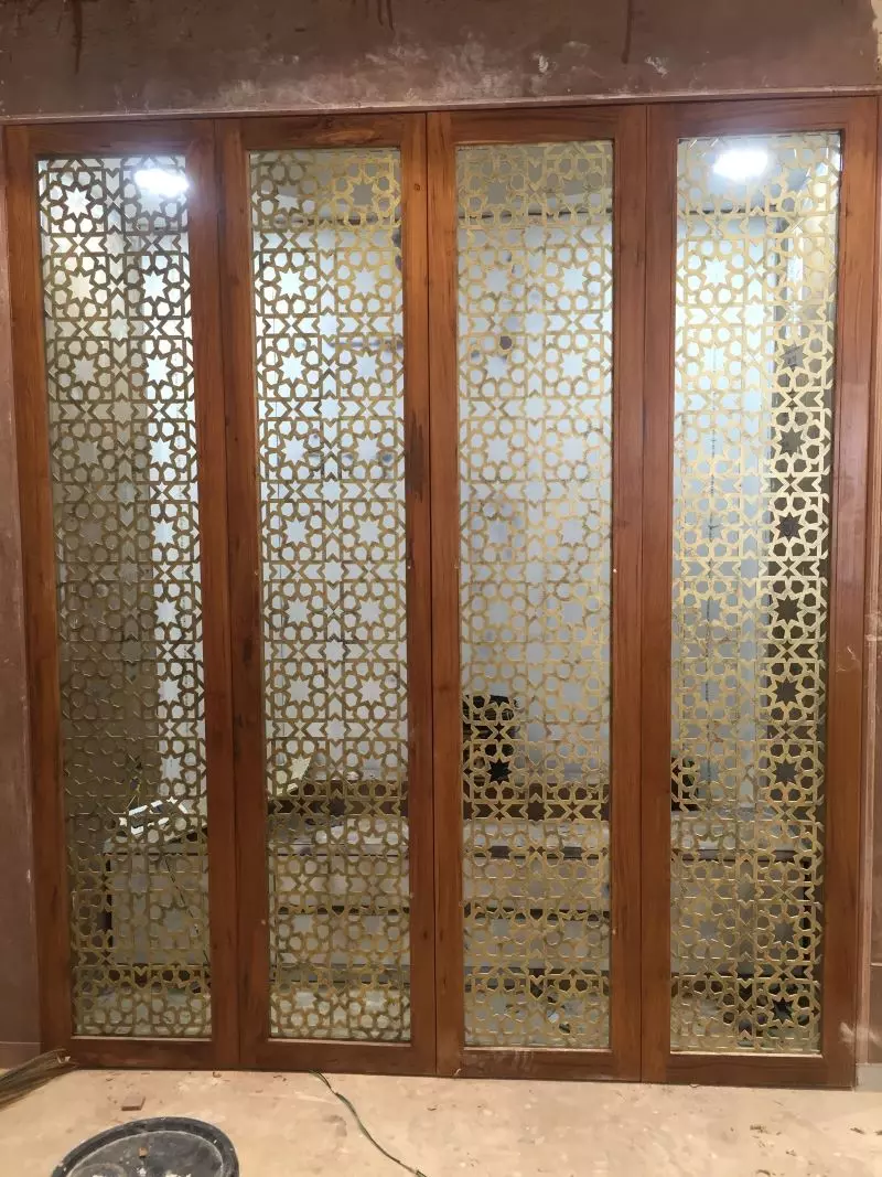 Netted Pooja Room Door Frame Design